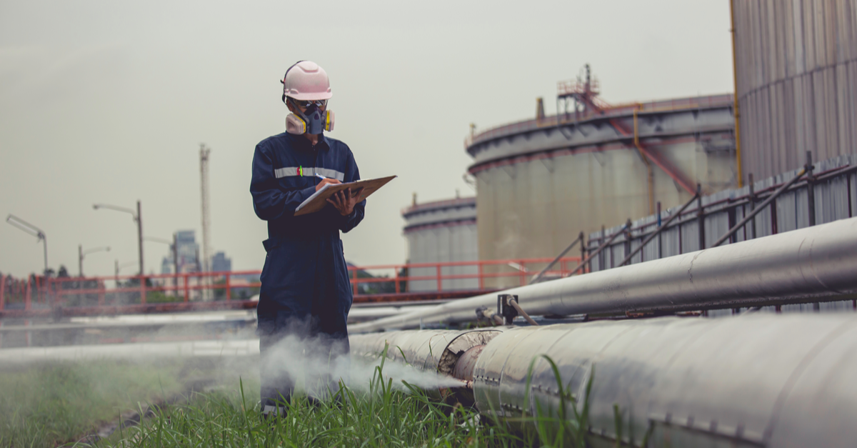 Male worker inspection visual pipeline oil and gas corrosion rust through socket tube steam gas leak pipeline