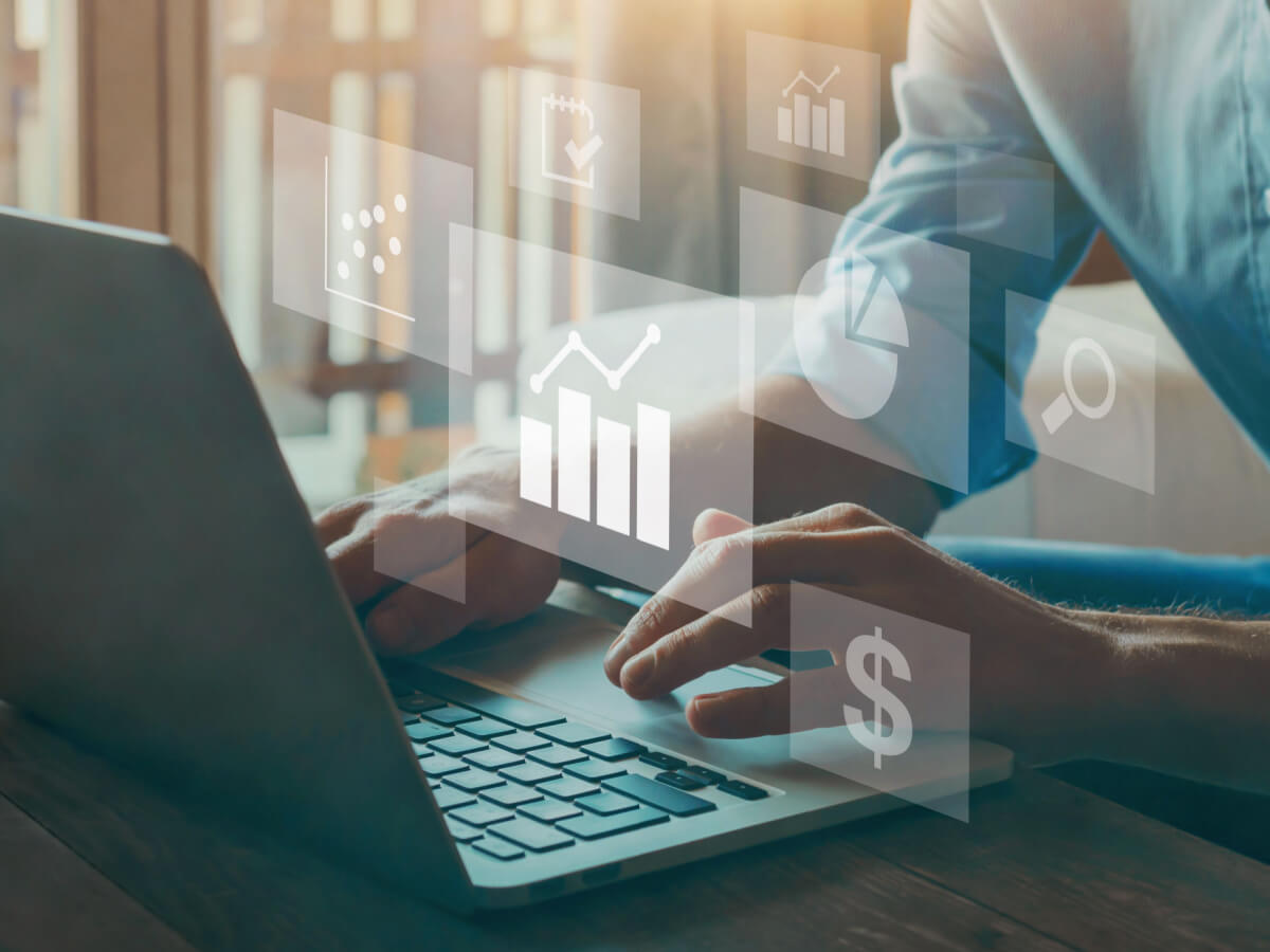 Man-working-on-computer-optimizing-financial-tasks-with-automation