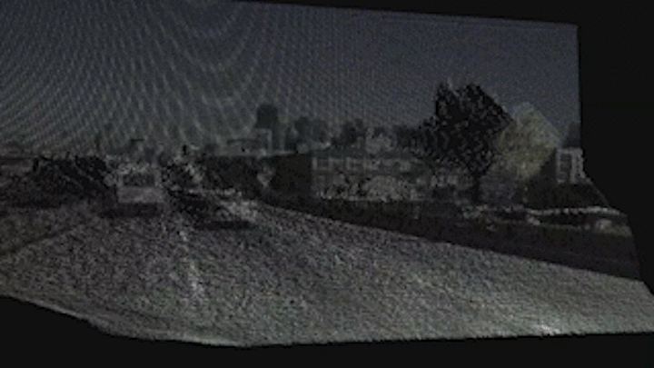Using only cameras, Compound Eye's VIDAS platform teaches vehicles to see the world in 3-D as humans do. Imagine you're in a fast-moving vehicle on a busy highway, and VIDAS is in the driver's seat. This GIF shows what the world looks like through the eyes of VIDAS. It's blurry and pixellated, with the city skyline, busses, trucks, and cars speeding past. But the world is still recognizable because VIDAS helps the vehicle see as humans do. 