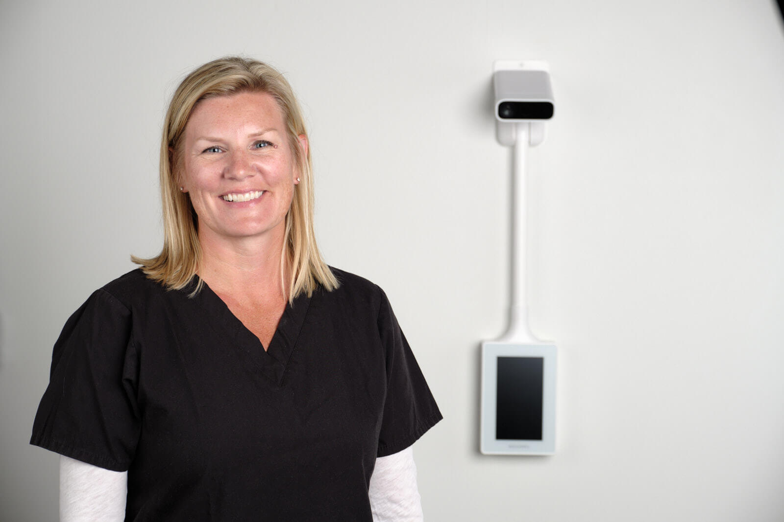 A nurse with Ocuvera’s portable fall prevention device.
